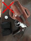 Holster must cover the trigger guard